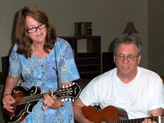 Shirlee Smith Matheson plays guitar